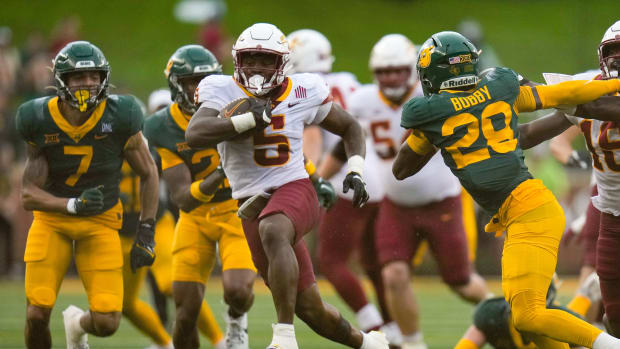 Oct 28, 2023; Waco, Texas, USA; Iowa State Cyclones running back Cartevious Norton (5) runs past Baylor Bears safety Devyn Bobby (28) for a touchdown during the second half at McLane Stadium.