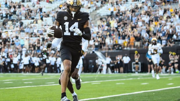 Sep 30, 2023; Nashville, Tennessee, USA; Vanderbilt Commodores wide receiver Will Sheppard (14) scores a touchdown against the Missouri Tigers during the second half at FirstBank Stadium. Mandatory Credit: Steve Roberts-USA TODAY Sports