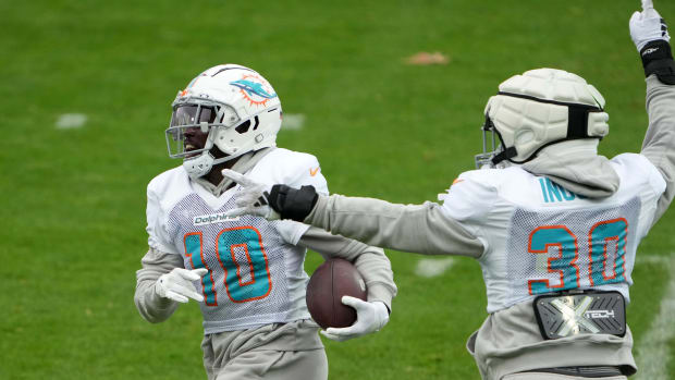 Nov 2, 2023; Frankfurt, Germany; Miami Dolphins wide receiver Tyreek Hill (10) and fullback Alec Ingold (30) during practice at the PSD Bank Arena. Mandatory Credit: Kirby Lee-USA TODAY Sports