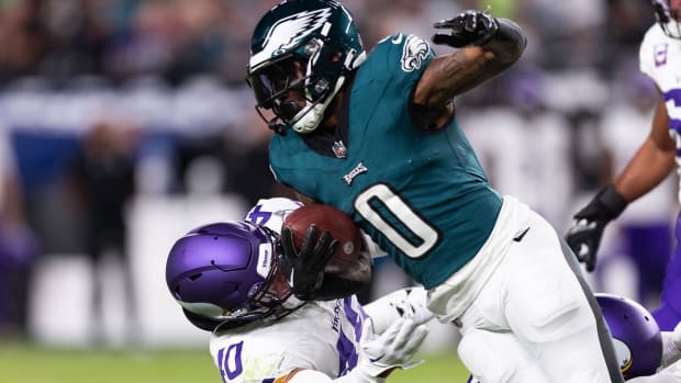 Sep 14, 2023; Philadelphia, Pennsylvania, USA; Philadelphia Eagles running back D'Andre Swift (0) runs with the ball against Minnesota Vikings linebacker Ivan Pace Jr. (40) during the first quarter at Lincoln Financial Field. Mandatory Credit: Bill Streicher-USA TODAY Sports
