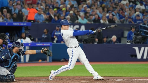Toronto Blue Jays third baseman Matt Chapman hits a double against the Tampa Bay Rays during the third inning at Rogers Centre. (2023)