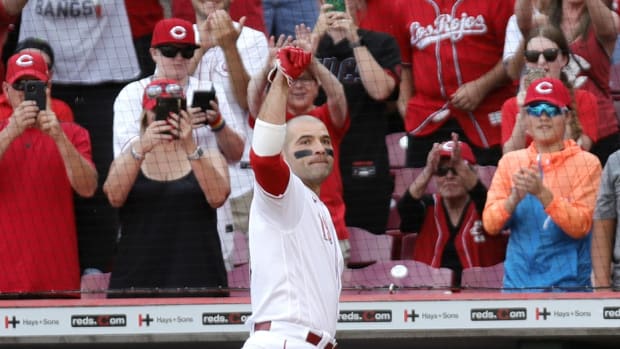 Sep 24, 2023; Cincinnati, Ohio, USA; Cincinnati Reds first baseman Joey Votto (19) acknowledges the crowd after hitting a single against the Pittsburgh Pirates during the eighth inning at Great American Ball Park. Mandatory Credit: David Kohl-USA TODAY Sports  