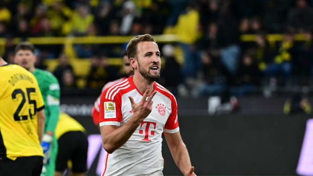 Harry Kane pictured celebrating after scoring a hat-trick for Bayern Munich during a 4-0 away win over Borussia Dortmund in November 2023