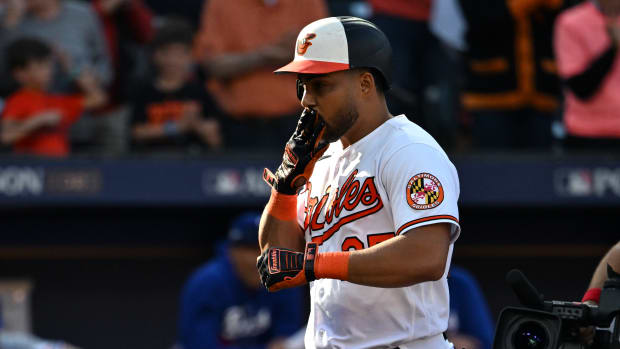 Oct 7, 2023; Baltimore, Maryland, USA; Baltimore Orioles designated hitter Anthony Santander (25) celebrates after hitting a home run against the Texas Rangers during the sixth inning in game one of the ALDS for the 2023 MLB playoffs at Oriole Park at Camden Yards. Mandatory Credit: Tommy Gilligan-USA TODAY Sports