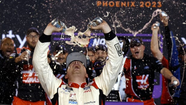 Cole Custer celebrates in victory lane Saturday after winning the NASCAR Xfinity Series Championship at Phoenix Raceway. (Photo by Chris Graythen/Getty Images)