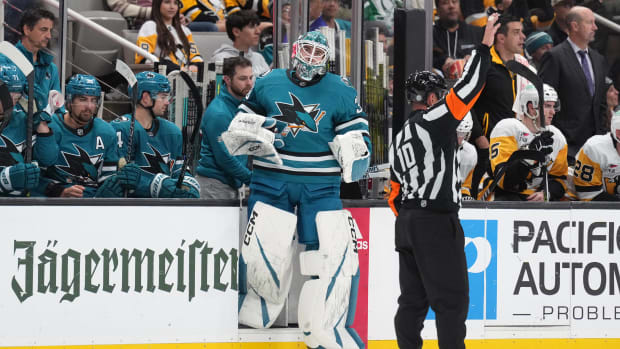 Sharks goalie Magnus Chrona enters San Jose's 10-2 loss to the Penguins on Nov. 4, 2023.