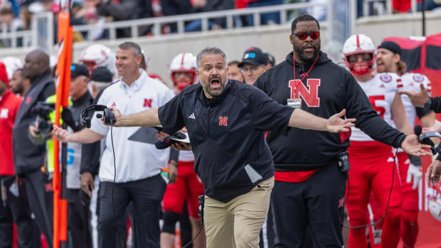 Nebraska coach Matt Rhule inquires with the officials about a call at Michigan State (Nov. 4, 2023)