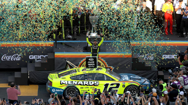 Ryan Blaney celebrates his first NASCAR Cup championship at Phoenix Raceway. Can he make it two in a row in 2024? (Photo by Christian Petersen/Getty Images)