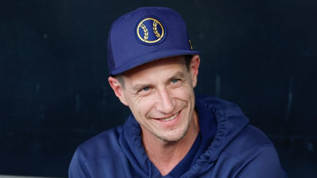 Brewers manager Craig Counsell smiles