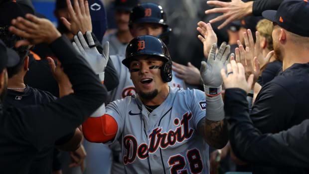 Sep 16, 2023; Anaheim, California, USA; Detroit Tigers shortstop Javier Baez (28) is greeted in the dugout after scoring a run on a three-run home run by second baseman Zack Short (not pictured) during the second inning against the Los Angeles Angels at Angel Stadium.