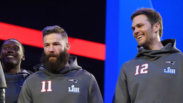 New England Patriots quarterback Tom Brady and wide receiver Julian Edelman during Opening Night for Super Bowl LIII at State Farm Arena.