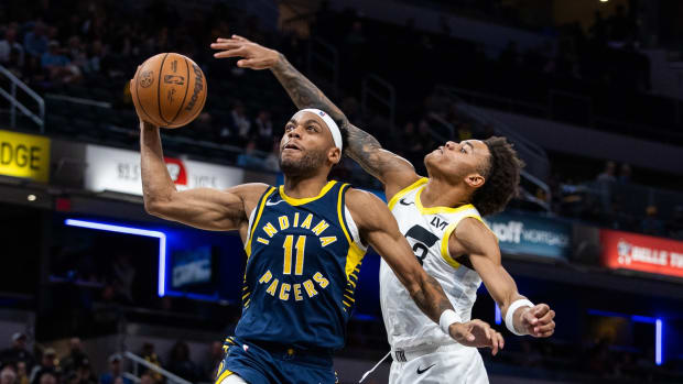 Indiana Pacers forward Bruce Brown (11) shoots the ball while Utah Jazz guard Keyonte George (3) defends in the second half at Gainbridge Fieldhouse.