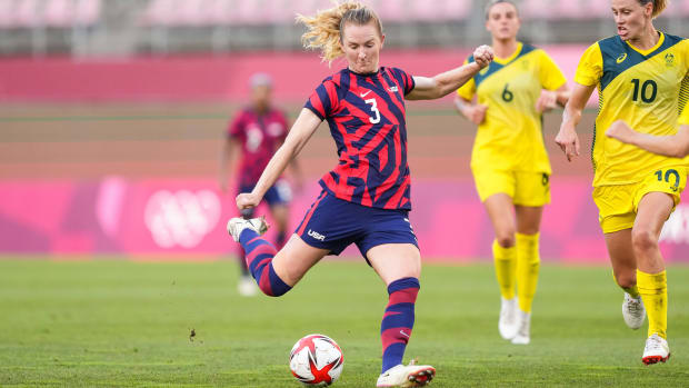 Sam Mewis shoots the ball during the USWNT’s match vs. Australia at the 2021 Olympics.