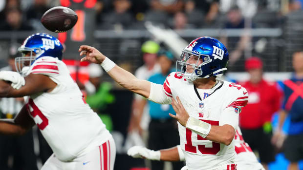 Nov 5, 2023; Paradise, Nevada, USA; New York Giants quarterback Tommy DeVito (15) throws against the Las Vegas Raiders during the fourth quarter at Allegiant Stadium.