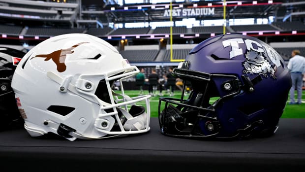 Jul 12, 2023; Arlington, TX, USA; A view of the Texas Longhorns and TCU Horned Frogs helmets and logos during Big 12 football media day at AT&T Stadium. Mandatory Credit: Jerome Miron-USA TODAY Sports