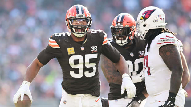 Nov 5, 2023; Cleveland, Ohio, USA; Cleveland Browns defensive end Myles Garrett (95) celebrates after recovering a fumble during the second half against the Arizona Cardinals at Cleveland Browns Stadium