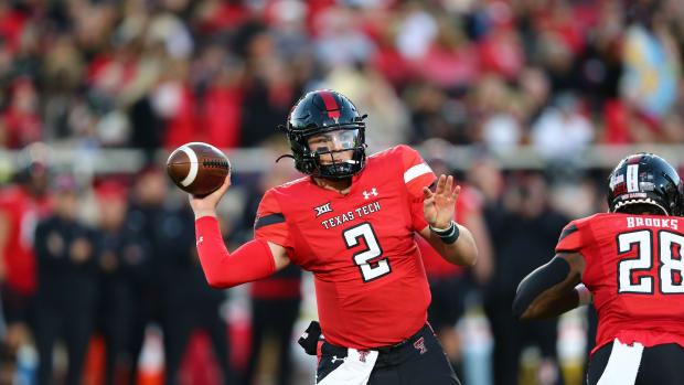 Nov 2, 2023; Lubbock, Texas, USA; Texas Tech Red Raiders quarterback Behren Morton (2) passes against the Texas Christian Horned Frogs in the first half at Jones AT&T Stadium and Cody Campbell Field. Mandatory Credit: Michael C. Johnson-USA TODAY Sports  