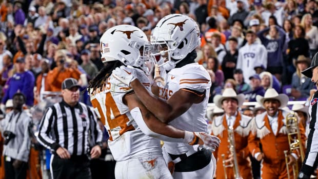 Nov 11, 2023; Fort Worth, Texas, USA; Texas Longhorns wide receiver Adonai Mitchell (5) and running back Jonathon Brooks (24) celebrates after Mitchell scores a touchdown against the TCU Horned Frogs during the first half at Amon G. Carter Stadium. Mandatory Credit: Jerome Miron-USA TODAY Sports