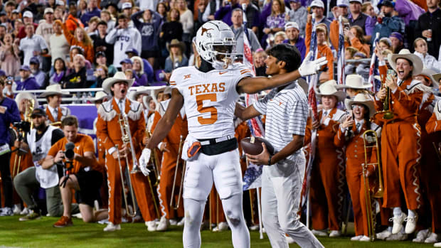 Nov 11, 2023; Fort Worth, Texas, USA; Texas Longhorns wide receiver Adonai Mitchell (5) celebrates after he scores a touchdown against the TCU Horned Frogs during the first half at Amon G. Carter Stadium. Mandatory Credit: Jerome Miron-USA TODAY Sports