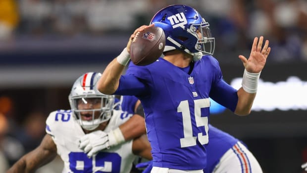 Nov 12, 2023; Arlington, Texas, USA; New York Giants quarterback Tommy DeVito (15) throws during the first quarter against the Dallas Cowboys at AT&T Stadium.