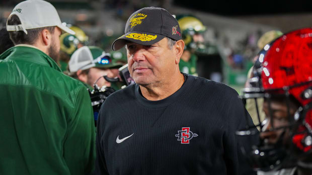 San Diego State coach Brady Hoke walks off the field after the game against Colorado State at Sonny Lubick Field at Canvas Stadium.