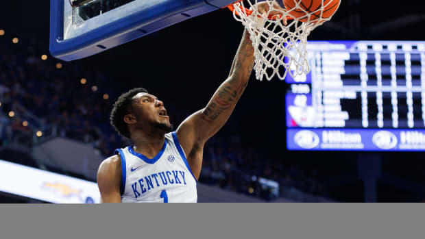 Nov 6, 2023; Lexington, Kentucky, USA; Kentucky Wildcats guard Justin Edwards (1) dunks the ball during the second half against the New Mexico State Aggies at Rupp Arena at Central Bank Center.