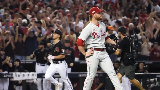 Philadelphia Phillies relief pitcher Craig Kimbrel (31) looks on as Arizona Diamondbacks center fielder Alek Thomas (5) rounds the bases after hitting a two-run home run during the eighth inning in Game 4 of the NLCS of the 2023 MLB playoffs at Chase Field in Phoenix on Oct. 20, 2023.