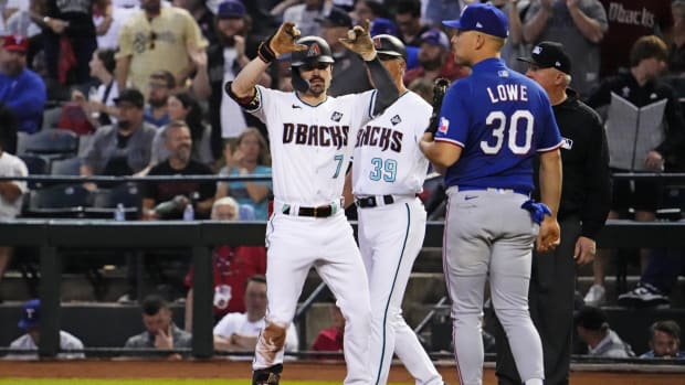 Arizona Diamondbacks left fielder Corbin Carroll (7) celebrates after hitting a single during the third inning against the Texas Rangers during game five of the 2023 World Series at Chase Field in Phoenix on Nov. 1, 2023.
