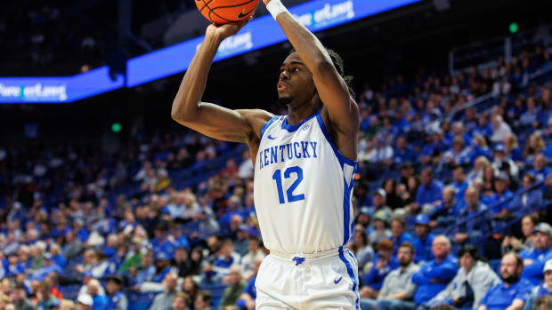 Nov 10, 2023; Lexington, Kentucky, USA; Kentucky Wildcats guard Antonio Reeves (12) shoots the ball during the second half against the Texas A&M Commerce Lions at Rupp Arena at Central Bank Center.
