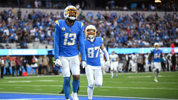 Nov 12, 2023; Inglewood, California, USA; Los Angeles Chargers wide receiver Keenan Allen (13) celebrates after scoring a touchdown against the Detroit Lions during the second half at SoFi Stadium. Mandatory Credit: Orlando Ramirez-USA TODAY Sports  