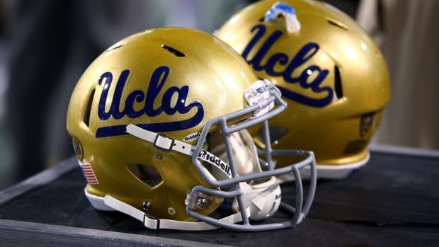 Sep 25, 2014; Tempe, AZ, USA; Detailed view of UCLA Bruins helmets on the sidelines against the Arizona State Sun Devils at Sun Devil Stadium. Mandatory Credit: Mark J. Rebilas-USA TODAY Sports