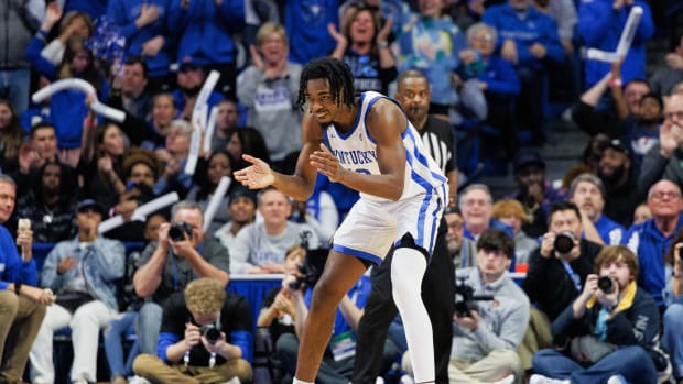Feb 25, 2023; Lexington, Kentucky, USA; Kentucky Wildcats guard Antonio Reeves (12) celebrates a basket during the second half against the Auburn Tigers at Rupp Arena at Central Bank Center. Mandatory Credit: Jordan Prather-USA TODAY Sports