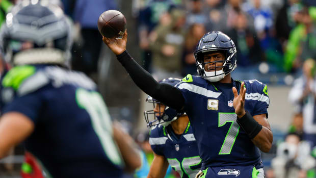 Seattle Seahawks quarterback Geno Smith (7) passes against the Washington Commanders during the second quarter at Lumen Field.
