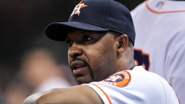 Aug 11, 2014; Houston, TX, USA; Houston Astros manager Bo Porter (16) watches from the dugout during the fourth inning against the Minnesota Twins at Minute Maid Park. Mandatory Credit: Troy Taormina-USA TODAY Sports