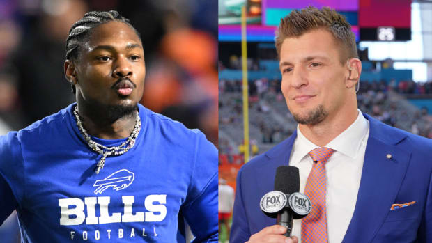 Bills receiver Stefon Diggs warms up before a game. Retired tight end Rob Gronkowski speaks on the Fox Sports pregame show.