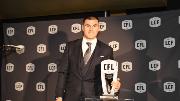 Nov 16, 2023; Niagra Falls, Ontario, CAN; Toronto Argonauts quarterback Chad Kelly poses with the trophy after winning the George Reed Most Outstanding Player during the CFL Awards at Fallsview Casino & Resort. Mandatory Credit: Dan Hamilton-USA TODAY Sports