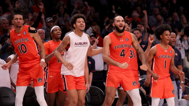 Nov 17, 2023; Brookyln, NY, USA; Players on the Auburn Tigers bench celebrate during the second half against the St. Bonaventure Bonnies at Barclays Center. Mandatory Credit: Brad Penner-USA TODAY Sports  