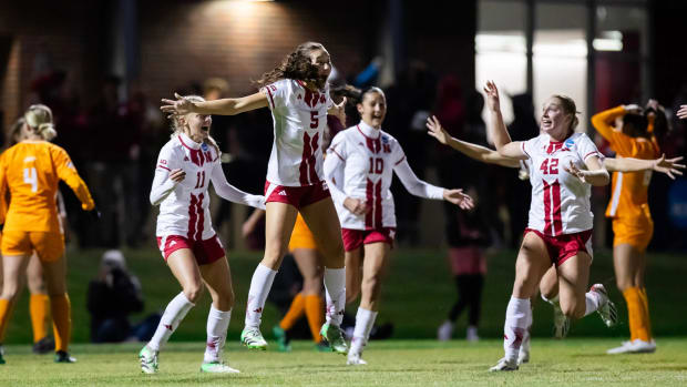 Ella Guyott (5) celebrates with her teammates after scoring the game-winner to beat Tennessee 2-1 in the second round of the NCAA Tournament (Nov. 17, 2023)