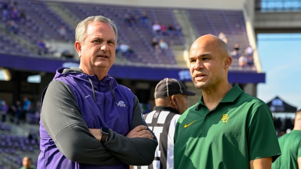 Nov 18, 2023; Fort Worth, Texas, USA; TCU Horned Frogs head coach Sonny Dykes (left) and Baylor Bears head coach Dave Aranda (right) before the game between the TCU Horned Frogs and the Baylor Bears at Amon G. Carter Stadium. Mandatory Credit: Jerome Miron-USA TODAY Sports