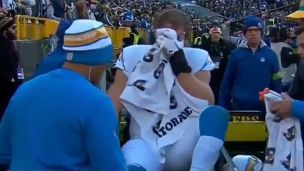 Chargers defensive end Joey Bosa being carted off the field vs. Packers.