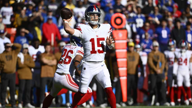 Nov 19, 2023; Landover, Maryland, USA; New York Giants quarterback Tommy DeVito (15) attempts a pass against the Washington Commanders during the first half at FedExField.