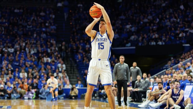 Nov 17, 2023; Lexington, Kentucky, USA; Kentucky Wildcats guard Reed Sheppard (15) makes a three point basket during the second half against the Stonehill Skyhawks at Rupp Arena at Central Bank Center. Mandatory Credit: Jordan Prather-USA TODAY Sports