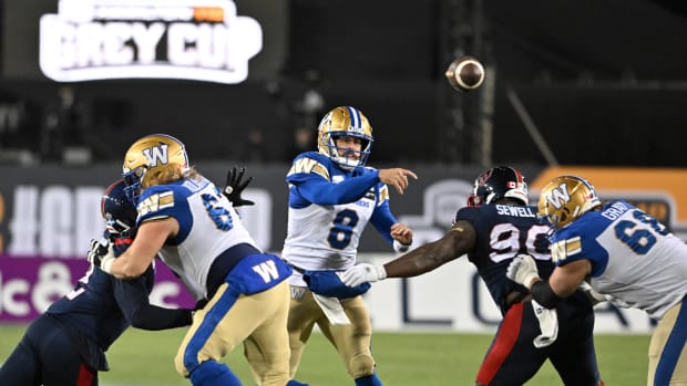 Nov 19, 2023; Hamilton, Ontario, CAN; Winnipeg Blue Bombers quarterback Zach Collaros (8) throws a pass against the Montreal Alouettes in the first half at Tim Hortons Field. Mandatory Credit: Dan Hamilton-USA TODAY Sports