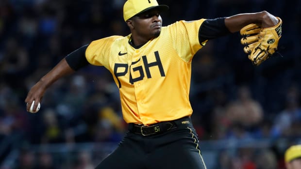 Jul 28, 2023; Pittsburgh, Pennsylvania, USA; Pittsburgh Pirates relief pitcher Yerry De Los Santos (57) pitches against the Philadelphia Phillies during the eighth inning at PNC Park. The Phillies won 2-1.