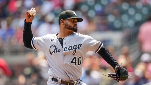 Jul 16, 2023; Cumberland, Georgia, USA; Chicago White Sox relief pitcher Reynaldo Lopez (40) pitches against the Atlanta Braves during the seventh inning at Truist Park.