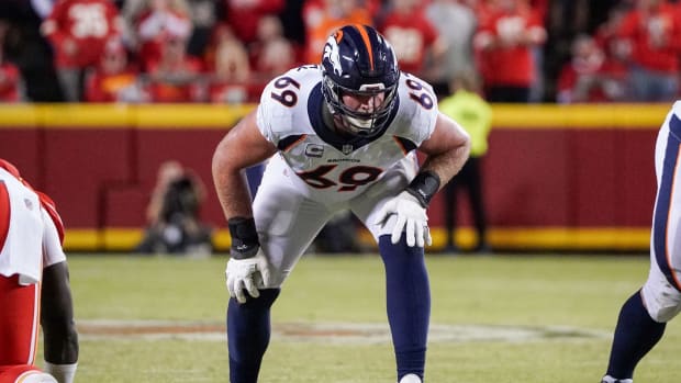 Denver Broncos offensive tackle Mike McGlinchey (69) lines up against the Kansas City Chiefs during the game at GEHA Field at Arrowhead Stadium.