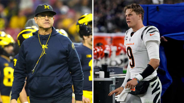 Jim Harbaugh walks on the sidelines; Joe Burrow walks out of the tent