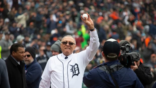 Willie Hernandez holds up the ball before throwing the ceremonial pitch during Detroit Tigers Opening Day game against the Kansas City Royals at Comerica Park on Thursday, April 4, 2019. Tigers 040419 05 Mw