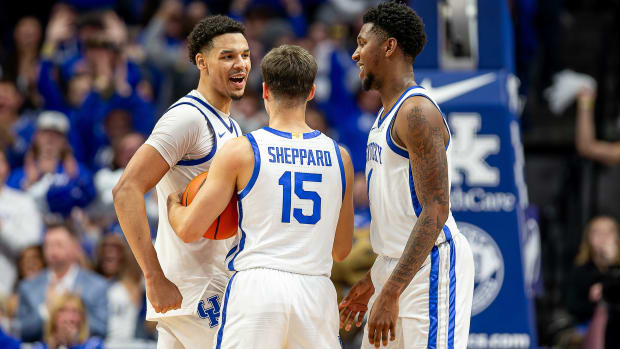 Kentucky's Tre Mitchell, Reed Sheppard and Justin Edwards celebrated at the end of overtime as the Wildcats took on the St. Joseph's Hawks at Rupp Arena on Monday night. The Wildcats outlasted the Hawks in overtime, 96-88. Nov. 20, 2023.