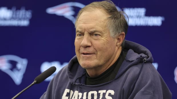Patriots head coach Bill Belichick speaks with the media during a press conference after a game.